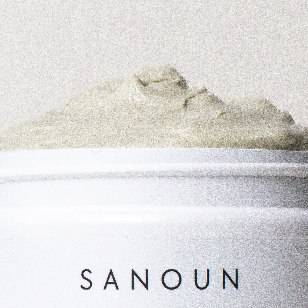 Close up of Sanoun Moringa and Shea Hair butter texture for damaged hair