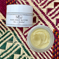 Close up of Small jar of Sanoun mini raw shea butter and texture