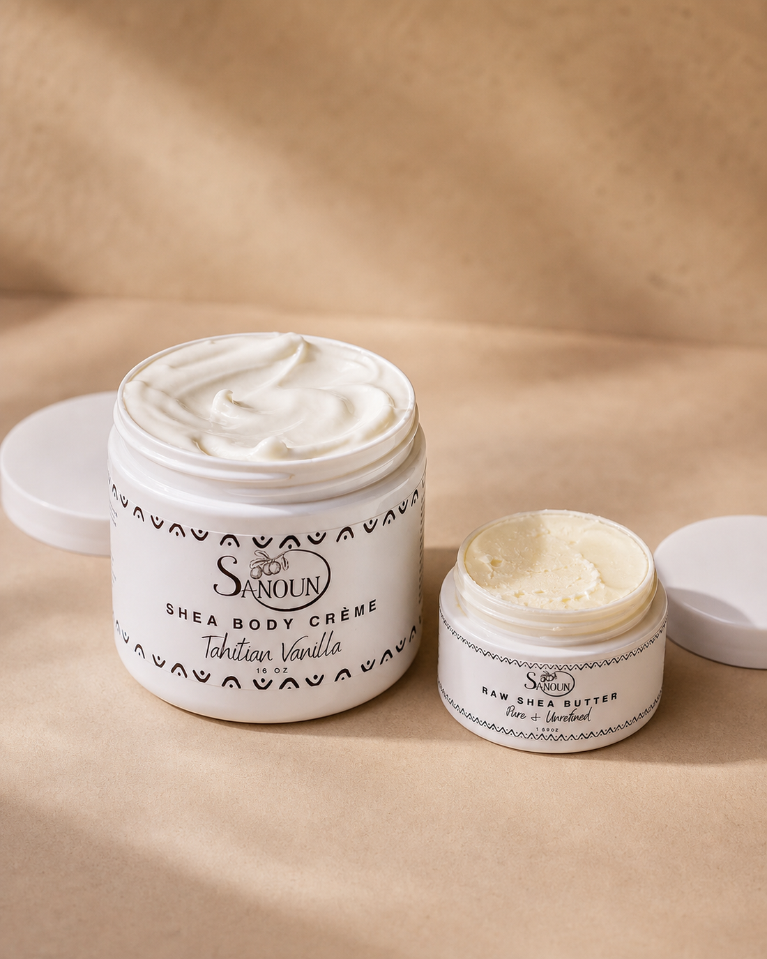 Open Vanilla Body Crème and Raw Shea Butter showing their different textures